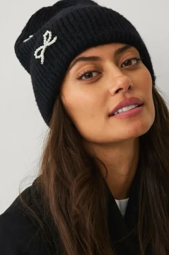 Ellos Collection Strikhue med sløjfedetaljer i perle