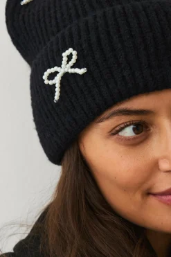 Ellos Collection Strikhue med sløjfedetaljer i perle