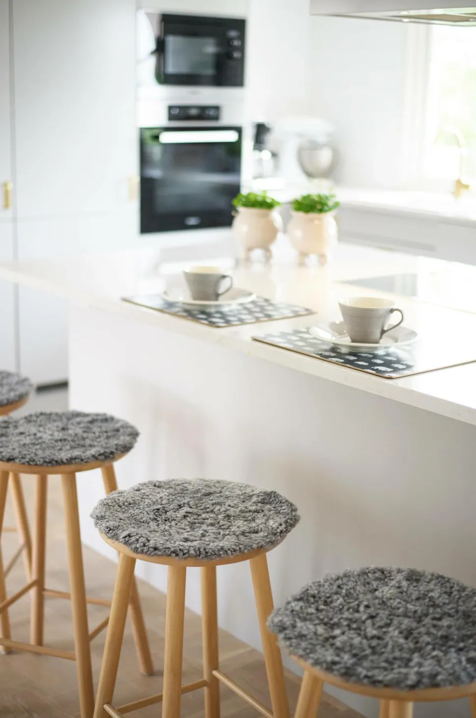 Skinnwille Rund siddepude Curly 4-pak